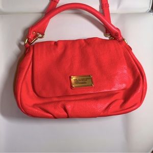Fluorescent pink Marc by Marc Jacobs bag.